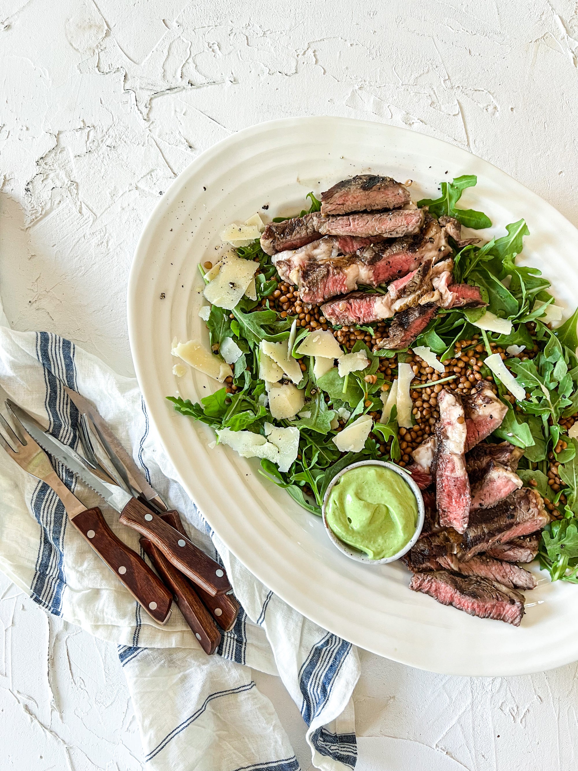 BBQ’d summer steak rocket parmesan salad with creamy herby dressing